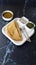 Dosa, Thin Pancake or crepe, is a South Indian meal served with sambhar and coconut chutney, Sauce