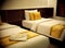 Double bed room with gold brown yellow colour pillows