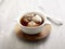 Double-Boiled Superior Chicken Soup with chopsticks served in a dish isolated on mat side view on grey background