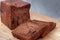 Double chocolate Shokupan or japanese bread loaf on wooden board