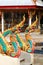 Double colorful golden dragon horse statue in Thai temple