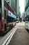 Double-decker trams and buses crossing the streets of Hong Kong