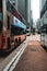 Double-decker trams and busses cruising the streets of Hong Kong