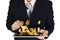 Double exposure of businessman using tablet to manage his business and give thumbs up on falling gold coins on tables.