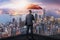 The double exposure image of the Businessmen are spreading umbrella during sunrise overlay with cityscape image. The concept of mo