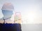 Double exposure man survey and civil engineer stand on ground working in a land building site over Blurred construction worker on