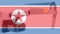 Double exposure of North Korea flag and quadcopter drone aerial camera