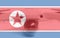 Double exposure of North Korea flag and quadcopter drone aerial camera