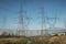 Double Exposure of Pylons ina field