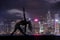 Double exposure of Silhouette yoga woman against Hong Kong city