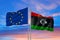 Double Flag European Union vs Libya waving flag with texture floating in the sky - 3D illustration - 3D render