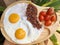 Double fried eggs with brown quinea