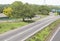 Double Lane Asphalt Highway with Sign Posted Off Ramp