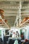 Double line of lifebuoy ring floatation inside a traveler ship . Vertical view blurry background