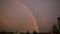 Double Rainbow on background of blue sky