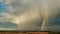 Double rainbow graces sky creating breathtaking scene