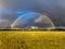 Double Rainbown over wheat field