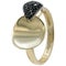Double ring in yellow gold on a white background with black diamonds