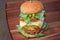 Double stacked crispy fried chicken burger recipe as sunny egg,cheese,mayonnaise, tomato sauce and lettuce