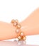 Double strand freshwater pearl bracelet on plastic mannequin female hand. Close up. Collection of luxury jewelry accessories.