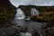 Double waterfall in river with silky water. dry autumn grass- Fairy Pools - Skye Island - Scotland - Uk