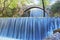 Double waterfalls of Palaiokaria in Trikala Thessaly Greece - stony arched bridge between the two waterfalls