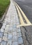 Double Yellow Lines & Brick Drainage Channel