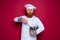 doubter chef with beard and red apron is ready to cook