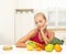 Doubting woman with fruits and hamburger