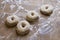 Dough being prepared to make donuts