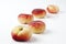 Doughnut peaches, white background