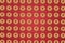 Doughnut repetition pattern on red background