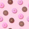Doughnut seamless patterns on pink background