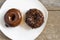 Doughnut server on plate with rustic background