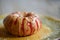 Doughnut server on plate with rustic background