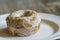 Doughnut server on plate with rustic background