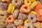 Doughnut shaped and circular cereals, very colorful