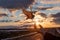 Dove flies up to the hand against the backdrop of a sunny sunset