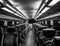 Dover, NJ USA - November 1, 2017: NJ Transit train at night with empty seats, black and white