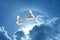 Doves in the air symbol of faith over shiny background