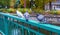 Doves standing on a green rail bridge