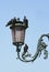 Doves on street lamp