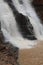 Down View of Tirathgarh Waterfall with Rocks at the edge