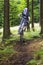 Downhill mountain biker in a forest near Kronberg, Germany