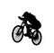 Downhill mountainbiker at the jump, mtb black silhouette.