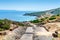 Downhill path in Tharros archaeological site on a sunny day