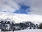 Downhill slope and apres ski and beautiful view of the Alps mountains