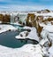 Downstream from Hranabjargafoss waterfall In Iceland during winter
