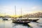 Downtown cityscape by Douro river with old boats, Porto, Portugal