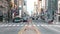 Downtown cityscape time-lapse of car traffic transportation, people walk cross road in Philadelphia, USA. Public transport concept